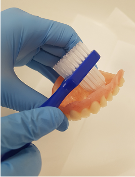 Denture cleaning for the inside surface